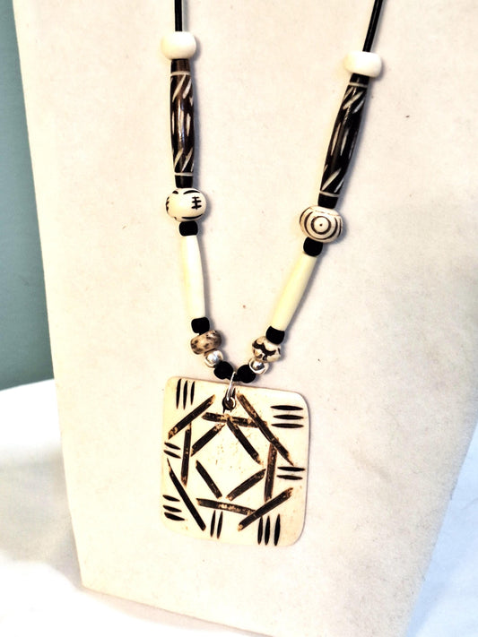 African Art Pendant  necklace, Buffalo bone beads hand carved and painted.